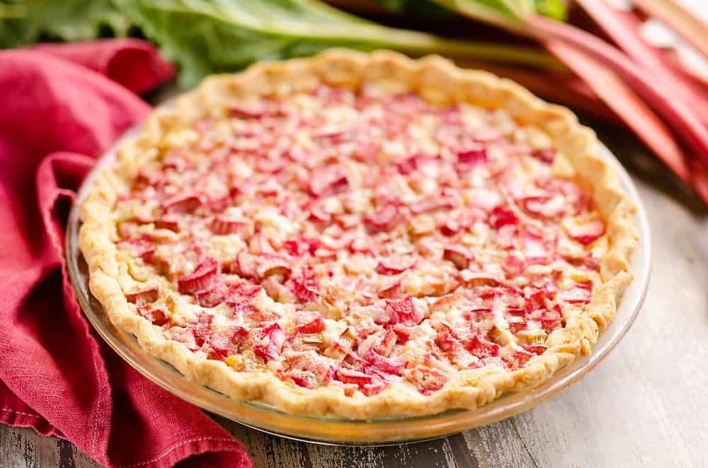 Rhubarb Custard Pie on table with red napkin